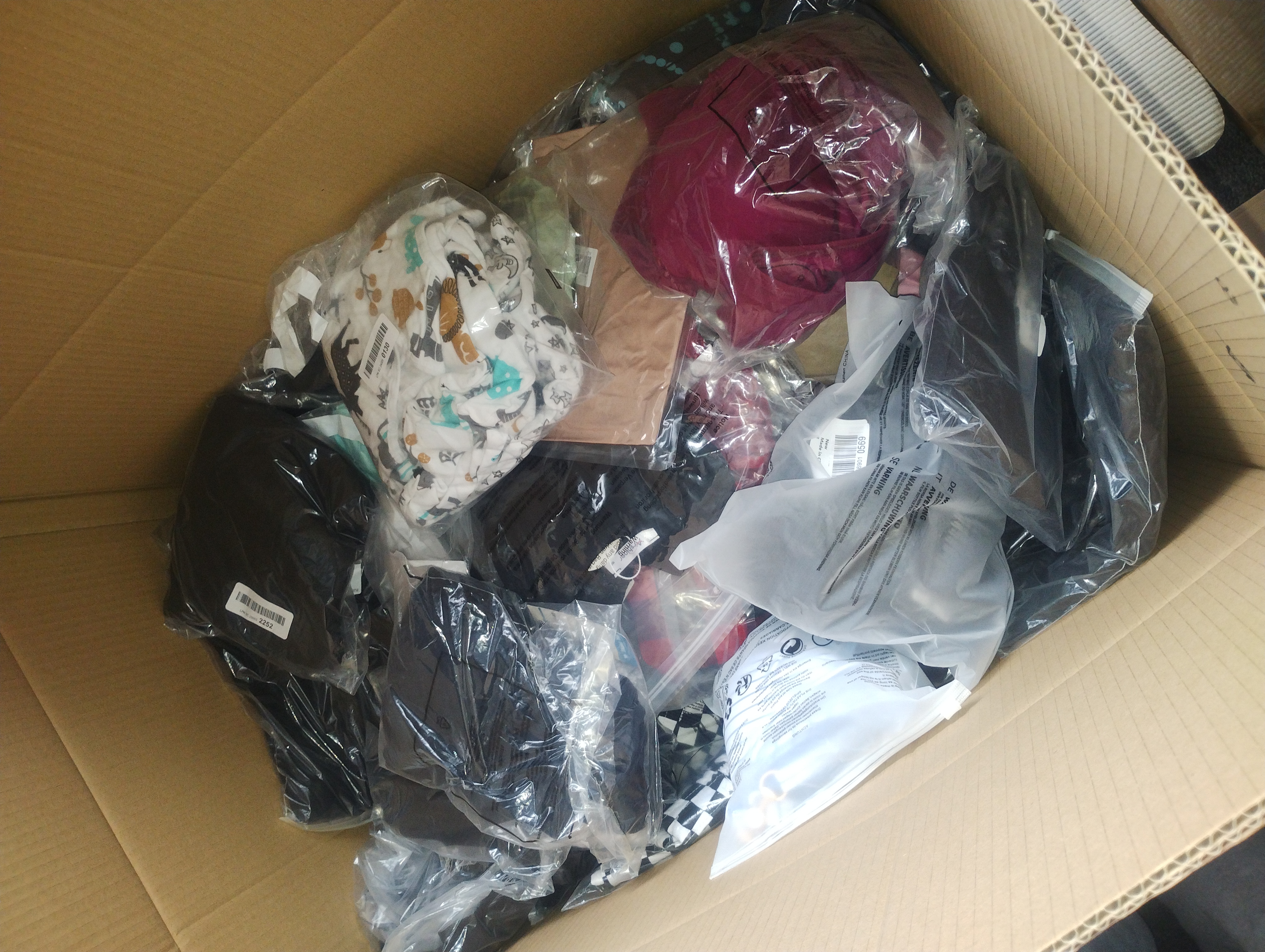 Small box of mixed clothes